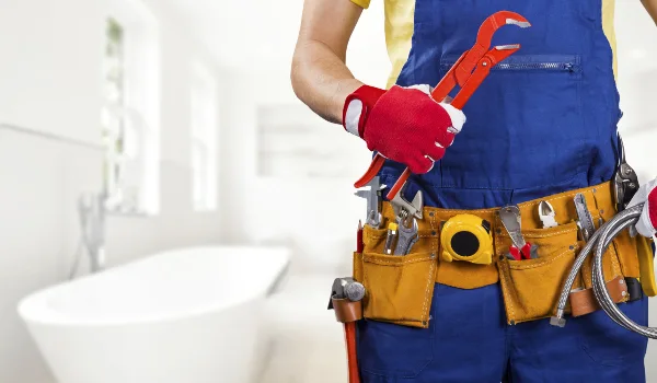 The torso of plumbing technician showing a tool belt from Plumber Pflugerville in Pflugerville, TX - Commercial plumbing services
