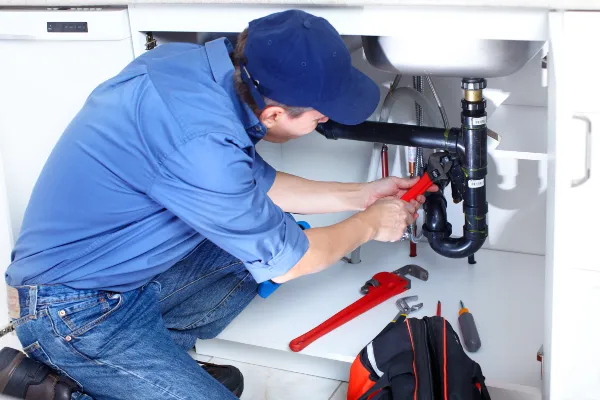 a male plumber fixing a toilet from Plumber Pflugerville in Pflugerville, TX Plumber near me a male plumber fixing a toilet from Plumber Pflugerville in Pflugerville, TX Plumber near me
